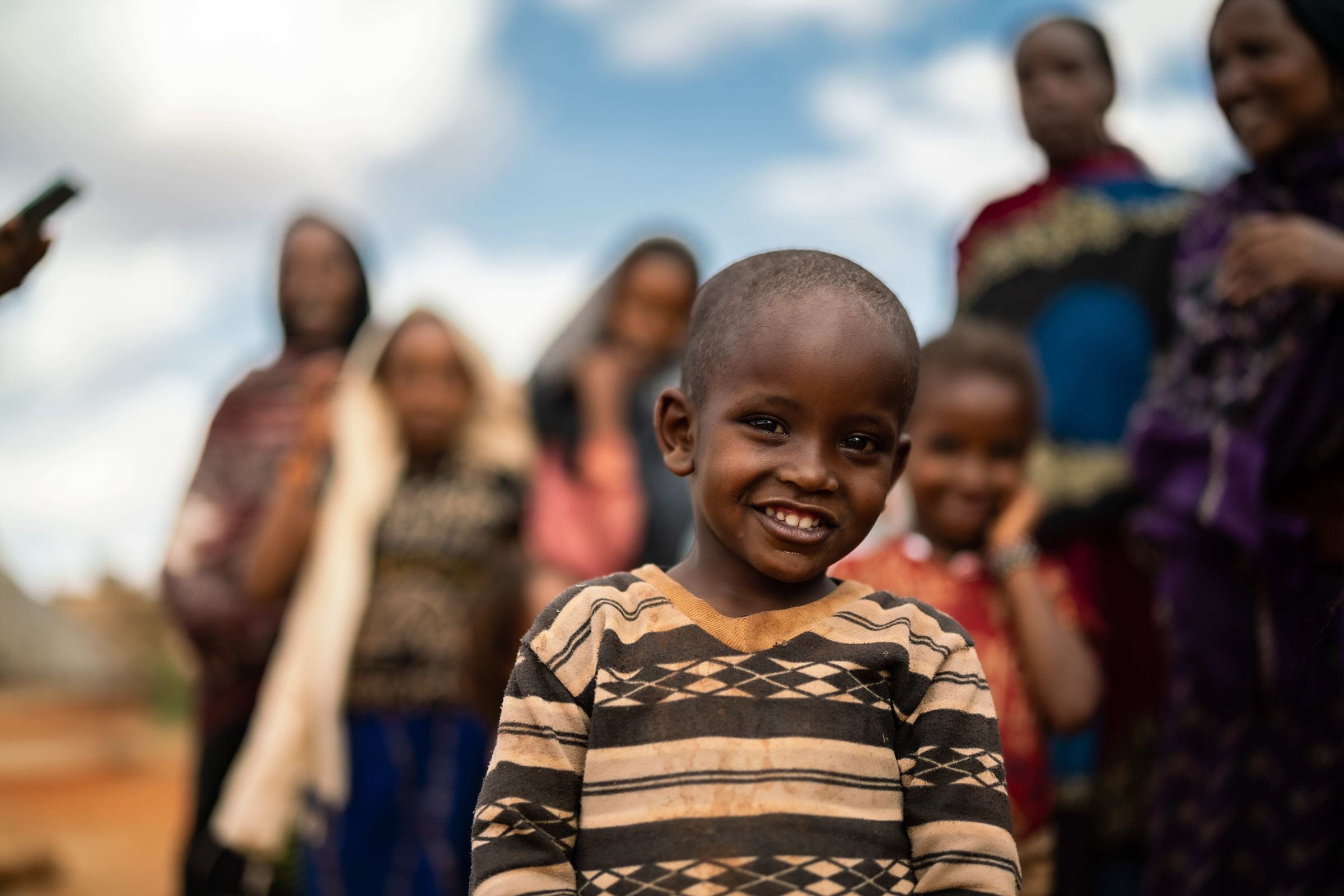 Junge lächelt in die Kamera (Quelle: Jakob Studnar) Junge lächelt in die Kamera (Quelle: Jakob Studnar)