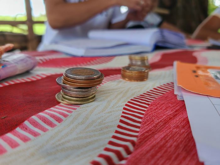 Small stacks of coins (Source: Kindernothilfe-Partner)